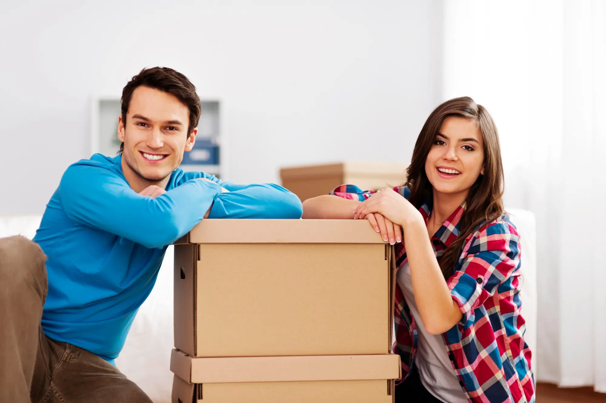 Happy Couples in New Home After Moving